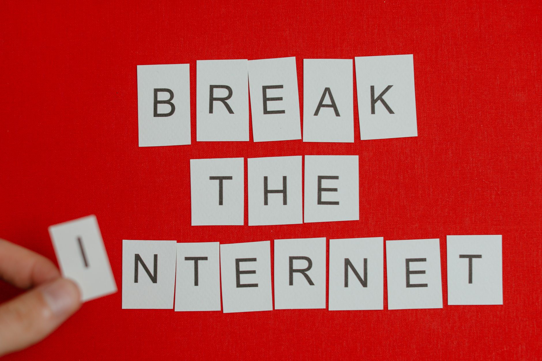 Cutout letters forming 'Break the Internet' on a vibrant red background. — Spieleentwickler im Spinight Casino vorgestellt